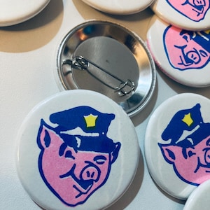 Officer Porky Button by World Famous Original