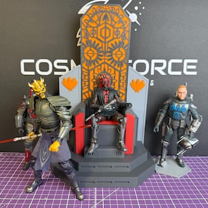 May include: Action figures of characters from a science fiction franchise. One figure is seated on a throne with an orange and gray design. Two other figures stand nearby, one holding a red lightsaber. The background is black with white text.