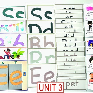 May include: A set of colorful alphabet flashcards with illustrations and text. The flashcards feature the letters C, D, R, and E. The text on the flashcards includes the letters and words like "cat", "dad", "rat", and "pet".