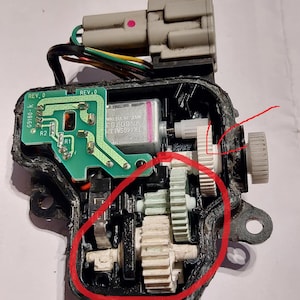 Nissan Leaf ZE1 charge plug lock gear & lock pin gear replacement (253E05sH0C, 253E05sH1C)