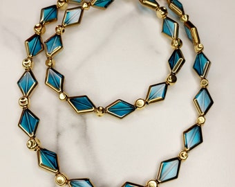 Handmade Gold Lined Blue Kite Shape Bead Necklace with Gold Accent Beads.  Original Design