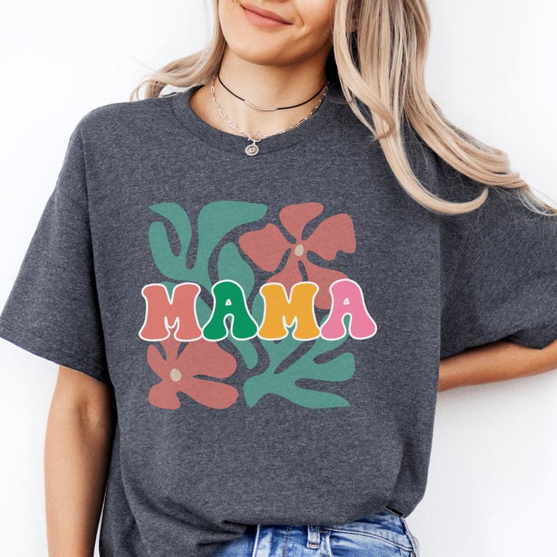 Retro mama t shirt with floral design and vintage style lettering, trendy mom graphic tee for women, breathable comfortable fabric for daily wear, perfect for casual outfits, relaxed looks, and gifting for Mother’s Day.