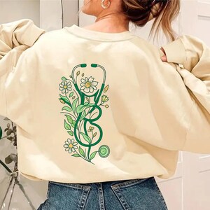 Custom Medical Top Professional Nurse Shirt Personalized Hospital Uniform Cotton Material Floral Stethoscope Pattern Customizable Name Design Perfect Medical Staff Wear Student Graduate Gift Beautiful Professional Style Quality Construction