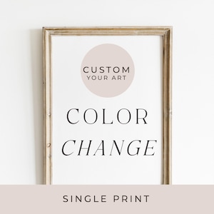 May include: A framed print with a light brown frame and a white background. The print features a circle with the text "CUSTOM YOUR ART" in black text. Below the circle, the text "COLOR CHANGE" is printed in black. At the bottom of the print, the text "SINGLE PRINT" is printed in black.