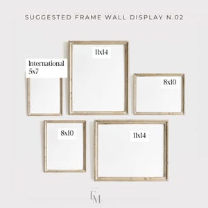 May include: A suggested frame wall display with five frames in various sizes. The frames are arranged in a staggered pattern. The frames are all white and have a light wood finish. The frames are labeled with their dimensions: 11x14, 8x10, 5x7, 11x14, and 8x10.