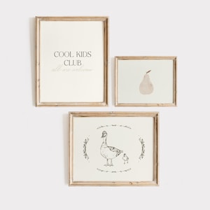 Timeless muted-tone prints for a cozy and elegant nursery or playroom.
