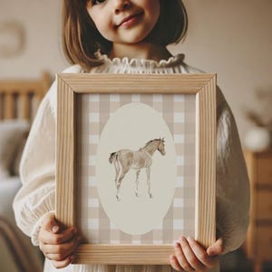 Western nursery girl decor featuring soft pastel tones and coquette nursery wall art.