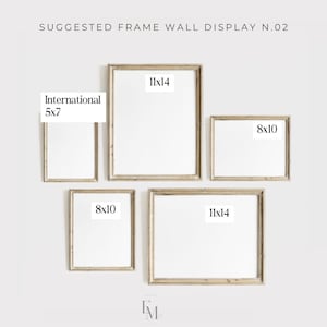 May include: A wall display of five framed art pieces. The frames are a light brown colour. The sizes are 28x36 cm, 20x25 cm, and International 13x18 cm. The text "SUGGESTED FRAME WALL DISPLAY N.02" is at the top.