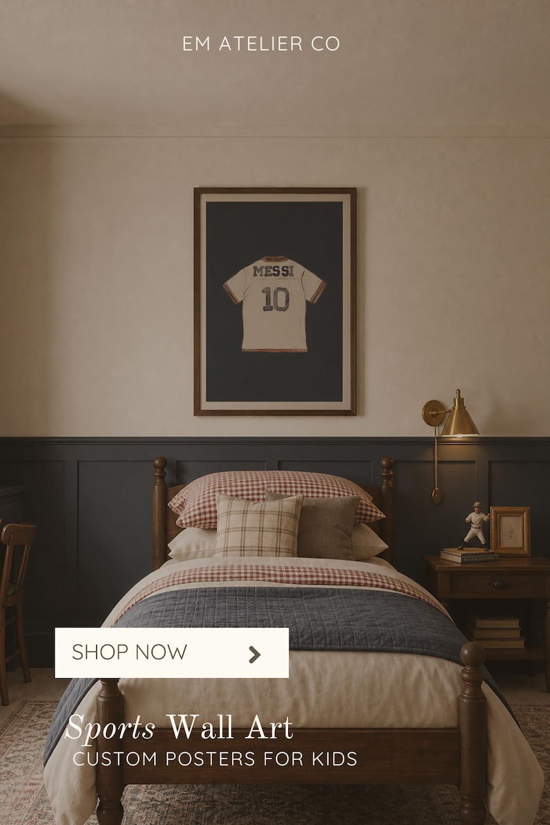 May include: A framed poster featuring a soccer jersey with "MESSI 10" on a dark background hangs above a bed with a patterned comforter. The room has a warm, inviting aesthetic, with a bedside table and a wall-mounted lamp. Text on the image reads "Sports Wall Art, Custom Posters for Kids."