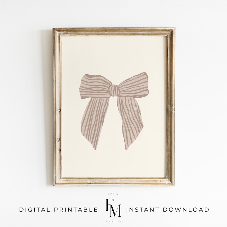 Elegant pink bow wall art for a vintage-inspired nursery or girl's bedroom.