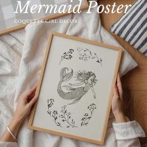 Mermaid antique drawing, ideal for a whimsical coastal-inspired playroom.