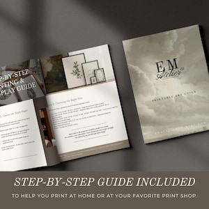 May include: A printed art guide with a soft, neutral color palette. The cover features the text "EM Atelier" and "Printable Art Guide." Inside, the guide offers step-by-step instructions for printing and displaying art, with examples of framed prints.