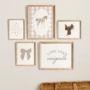 Coquette nursery wall art with a cowgirl theme, ideal for vintage-inspired girl room decor.