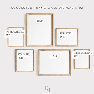 May include: A suggested wall display layout for picture frames. The layout includes five frames in various sizes, including 5x7, 8x10, and 11x14 inches. The frames are arranged in a staggered pattern, with the largest frame in the center.