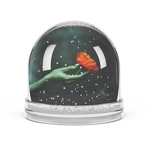 Böse Mohn-Schneekugel