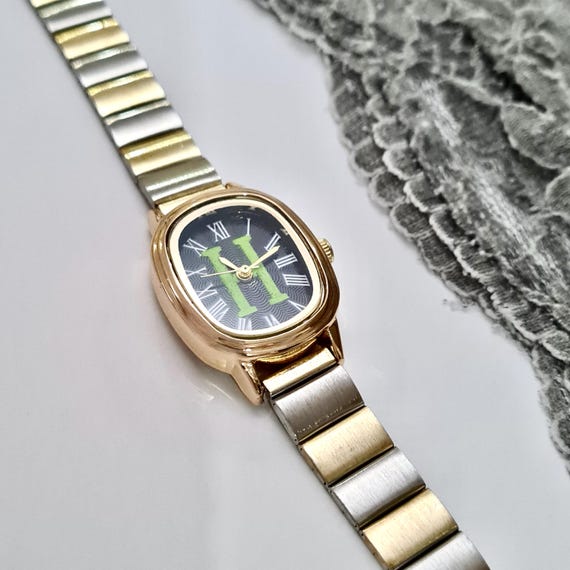 Gold and silver colour watch hotsell