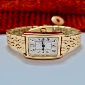 Armbanduhr für Frauen, Goldfarbe, römische Ziffern, quadratisches Design, einfache Bedienung, cooles Design, charismatisches Design, stilvoll, weißes Ziffernblatt Bild 2