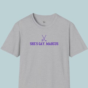 She's Gay Marcus Iconic PWHL Line T-Shirt Funny Montreal Hockey Tee. USA Delivery