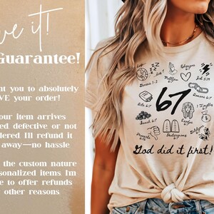 May include: Beige t-shirt with a graphic design featuring the number 67, various symbols, and the phrase "God did it first!". The shirt has a knotted front and is worn with blue jeans. The design includes a heart, a book, and other religious symbols.