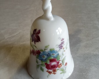 Bell with twisted handle and flowers