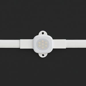 May include: A white LED light strip with a square light fixture in the centre. The fixture has seven small lights and is attached to the strip with a white bracket. The background is black.