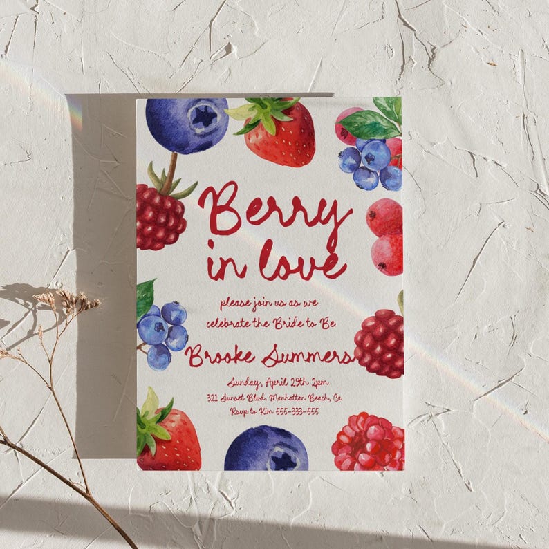 May include: A rectangular invitation with a white background, featuring watercolor illustrations of strawberries, blueberries, and raspberries. The text "Berry in love" is written in red script, with additional details about the event and the bride's name.