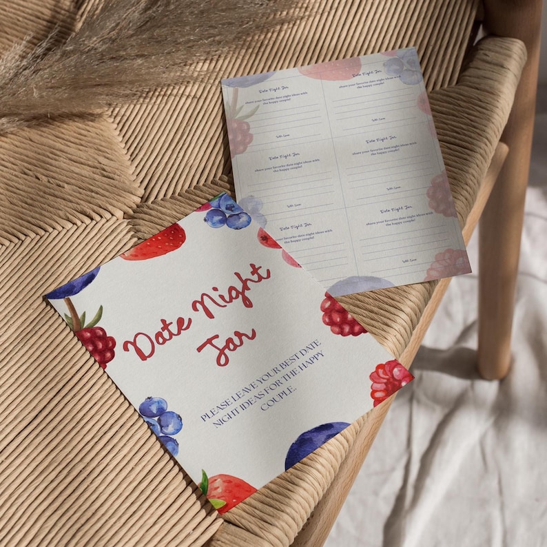May include: Two sheets of paper with a watercolor design of berries and the words "Date Night Jar" in red script. The design includes strawberries, blueberries, and raspberries. One sheet has lines for writing date night ideas.
