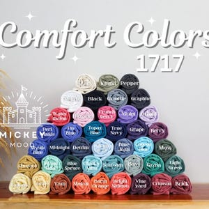 a pile of crochet yarn sitting on top of a wooden table