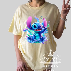 a woman wearing a t - shirt with a stitch stitch stitch stitch stitch stitch stitch