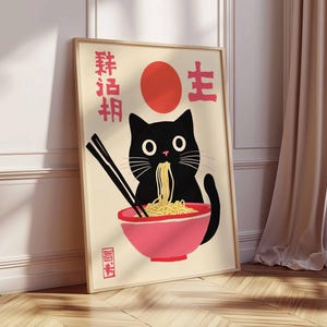 May include: A black cat with a red circle behind it is eating noodles from a pink bowl. The Japanese characters "粋 旨" and "主" are on the poster.