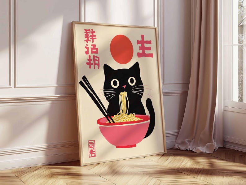 May include: A black cat with a red circle behind it is eating noodles from a pink bowl. The Japanese characters "粋 旨" and "主" are on the poster.