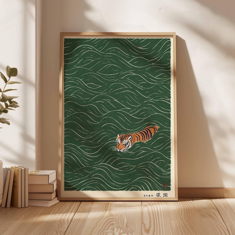 May include: A framed art print featuring a tiger swimming in green water with white wave patterns. The tiger has orange and black stripes. The artwork has Japanese text in the lower right corner.