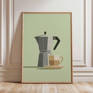 Może przedstawiać: Oprawiony wydruk z minimalistyczną ilustracją kawiarki, filiżanki i spodka. Grafika wykorzystuje odcienie szarości, brązu i beżu na jasnym zielonym tle. Wydruk jest eksponowany w pomieszczeniu z drewnianą podłogą.