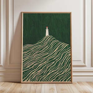 May include: Framed art print depicting a lighthouse on a green hill with beige lines. The lighthouse is white with a red top. The background is dark green, and the frame is light brown. A coastal themed art print.