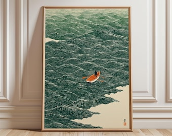 May include: Framed art print depicting a person in a small orange boat on a vast, textured green ocean. The artwork has a vintage aesthetic, with a minimalist style and a serene, yet isolated, feel. The print is in a wooden frame.