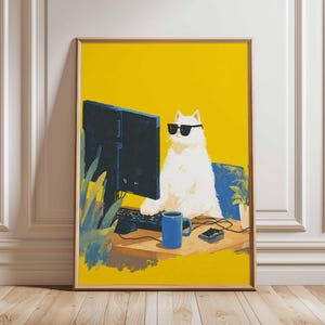 May include: A framed art print depicting a white cat wearing sunglasses, working at a computer. The cat is positioned in front of a black monitor, with a keyboard, a blue mug, and a small black device on the desk. The background is yellow.