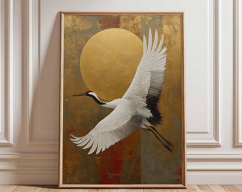May include: Framed artwork featuring a Japanese crane in flight against a golden sun and textured background. The crane has white feathers, black wingtips, and a red crown. The artwork is in a wooden frame.