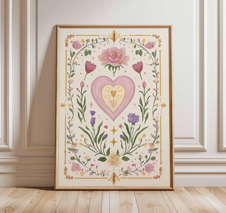 May include: A framed art print featuring a central heart design with a smaller heart inside, surrounded by floral elements. The artwork includes pink roses, purple tulips, and other flowers, with gold accents on a cream background. The frame is a warm brown color.