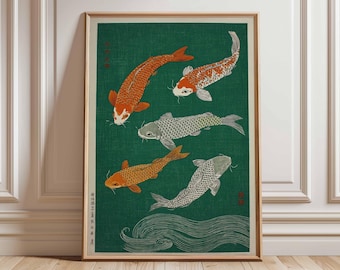 May include: A framed print featuring five koi fish in shades of orange and gray against a green background. The artwork has a traditional Japanese aesthetic, with stylized waves at the bottom and vertical text on the left side.