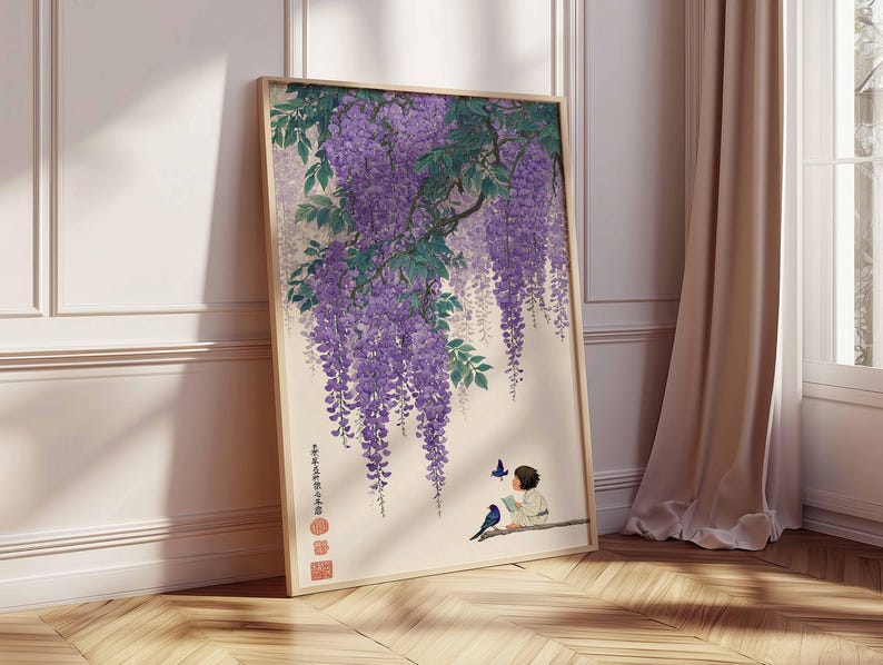 May include: A framed art print featuring a Japanese-style illustration of wisteria blossoms in shades of purple and green. A child is reading a book, with birds and butterflies nearby. The artwork is set against a cream background.