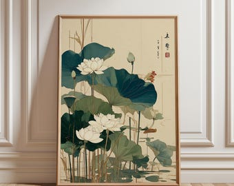 May include: A framed art print featuring a serene depiction of lotus flowers and lily pads in a pond. The artwork showcases white blossoms, large green leaves, and a muted color palette, evoking a sense of tranquility. The frame is a light brown color.