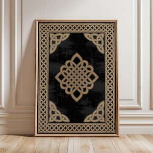 May include: Framed artwork featuring a black background with a gold Celtic knot design. The artwork has a gold border and corner knot accents. The frame is a light brown color, and the artwork is displayed on a wooden floor.