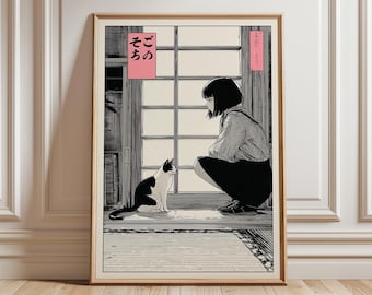 May include: Framed black and white illustration of a young person squatting and looking at a black and white cat. The cat is sitting on a mat. Japanese text is in pink boxes.