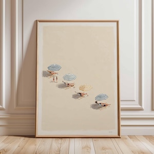May include: A framed art print showing a beach scene with people under striped umbrellas. The artwork features a sandy beach with deckchairs and colourful umbrellas, creating a calm, summery atmosphere. The print is encased in a wooden frame.