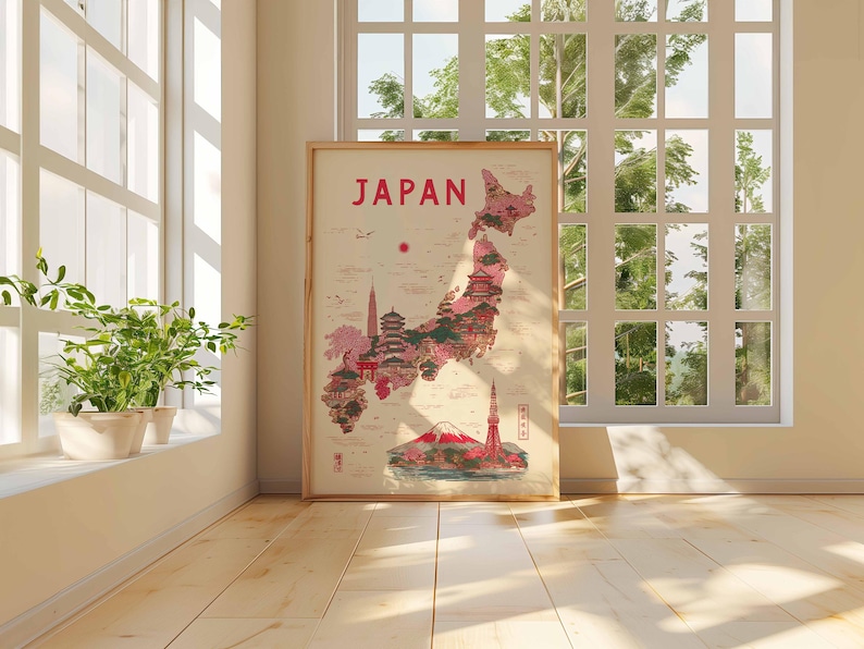 May include: A framed vintage-style map of Japan, featuring a detailed illustration of the country's landmarks and a red color scheme. The word "JAPAN" is at the top. The map is leaning against a wall near a window with sunlight.