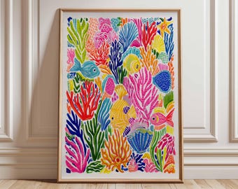 May include: A framed art print featuring a vibrant, colorful illustration of an underwater coral reef scene. The artwork showcases various coral formations, fish, and marine life in shades of pink, blue, yellow, and green, creating a lively and decorative piece.