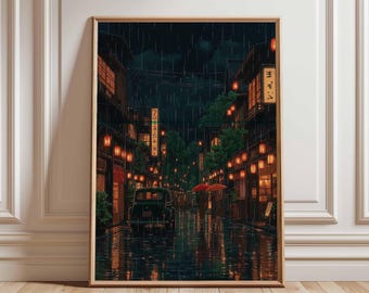 Puede incluir: Impresión enmarcada de una escena nocturna lluviosa en una ciudad japonesa. La obra de arte representa una calle bordeada de edificios iluminados por luces cálidas y faroles. Un coche antiguo está aparcado en la calle mojada y dos personas caminan con paraguas rojos.