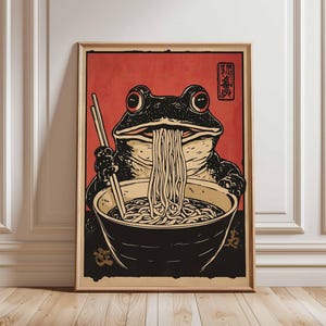 Frog Eating Ramen Poster – Japanese-Inspired Noodle Art, Cute Frog with Chopsticks, Fun Animal Illustration, Quirky Kitchen Decor