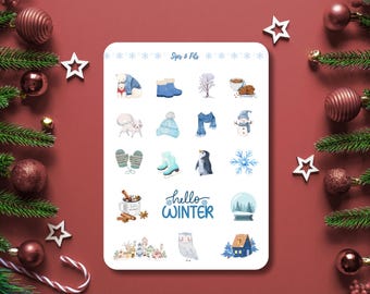 May include: A sticker sheet with winter-themed illustrations, including a polar bear, boots, a scarf, a snowman, mittens, ice skates, a penguin, and a snowflake. The words "hello WINTER" are also featured. The sheet is surrounded by Christmas decorations.