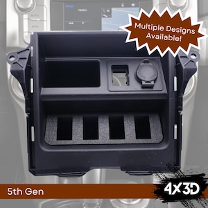 Könnte beinhalten: Schwarzes Kunststoff-Schalterpanel mit vier Schlitzen für Schalter und einem einzigen USB-Anschluss. Das Panel ist für die Montage in einem Toyota Tacoma der 5. Generation ausgelegt.